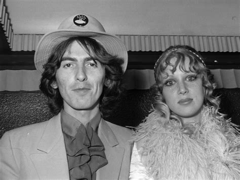 18th July 1968: George Harrison (1943 - 2001) of The Beatles and his wife Patti Boyd arriving at ...