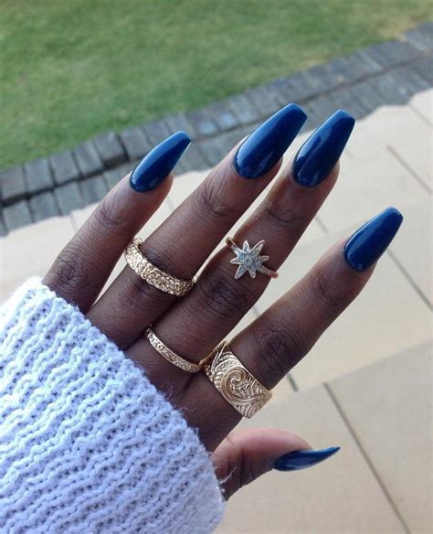 Blue nails on dark skin on Stylevore