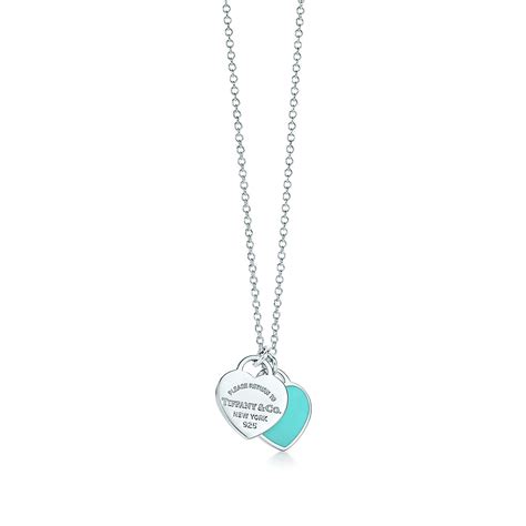 Return to Tiffany™ mini double heart tag pendant in silver with Tiffany Blue enamel finish on a ...