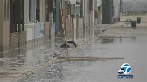 Seal Beach crews work to clear flooded streets caused by high tides as ...