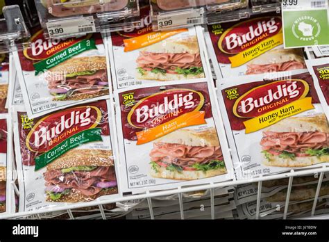 stacks of Buddig brand packaged sliced sandwich meat in the ...