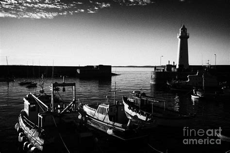 Donaghadee Harbour And Lighthouse County Down Photograph by Joe Fox