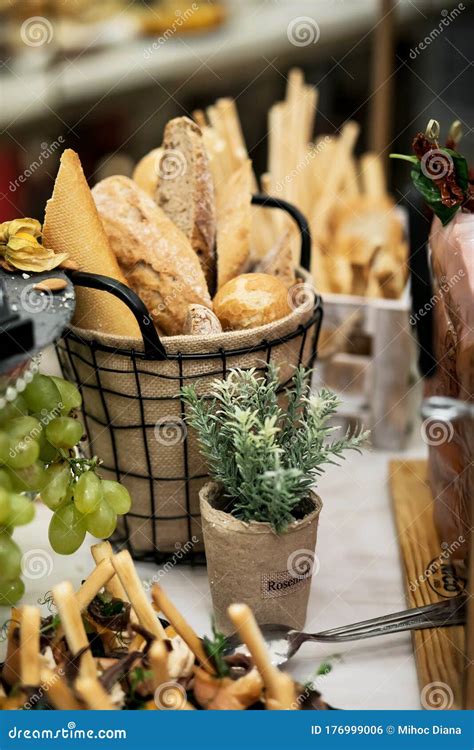 A Basket with Fresh Bread on a Buffet Table Stock Photo - Image of ...