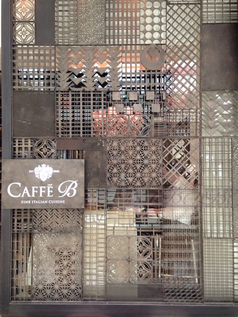 Great metal screen at restaurant in Singapore | Screen design, Metal screen, Design