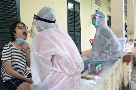 Vietnam warns of hospitals strain as COVID-19 cases spike after holiday | Reuters