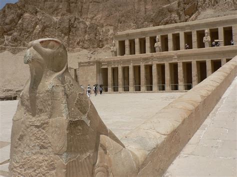 VISITORS FASCINATED BY TEMPLE OF HATSHEPSUT, THE FIRST FEMALE PHARAOH OF ANCIENT EGYPT