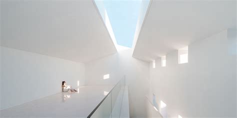 'the empty house' in space boasts triple-height modern interiors