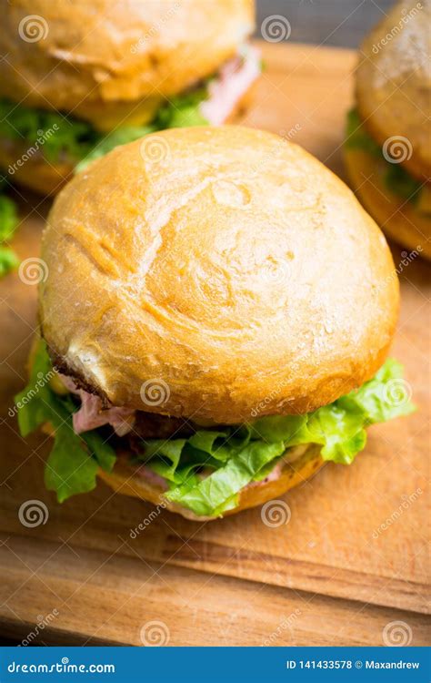 Tasty Burger with Fresh Buns, Meat and Salad Stock Photo - Image of ...