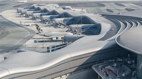 Gallery of Mirroring Desert Dunes, KPF's Terminal A at Zayed International Airport Opens in Abu ...