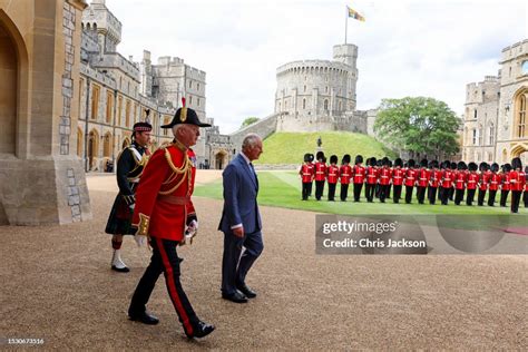 King Charles III arrives at the Sovereign's Entrance of Windsor... News ...