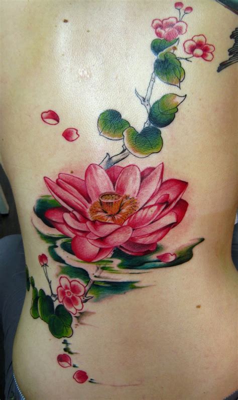 Beautiful red lotus tattoo on ribs - Tattooimages.biz