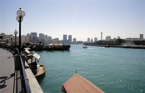 Dubai Creek, United Arab Emirates / DXB Dubai creek - creek panorama from Deira with dhows and ...