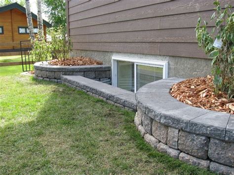 window well retaining walls | Window wells - Sweet Landscaping ...