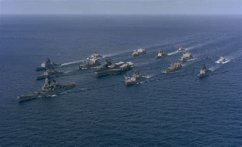 [2324 x 1416]USS Iowa (BB-61) and the USS Midway (CV-41) surrounded by other ships of Battle ...