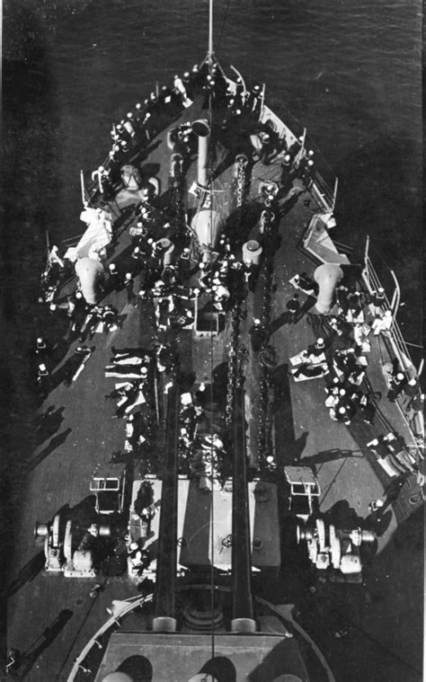 Crew of USS Connecticut (BB-18) relax on foredeck