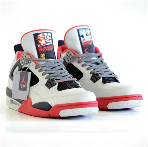 Air Jordan 4 Retro ‘NES’ Customs by Freaker Sneaks for $1,250 | The GoNintendo Archives | GoNintendo