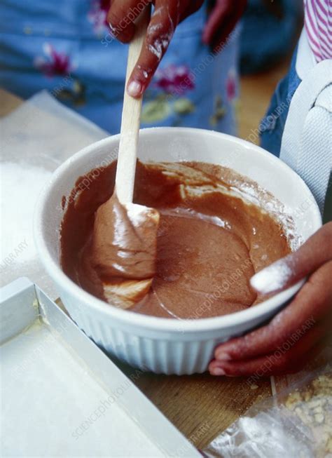 Baking a cake - Stock Image - P920/0854 - Science Photo Library