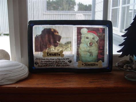 two dogs urn in a window Unique Celebration of life Funeral Memorials. Ashes in Glass Cremation ...