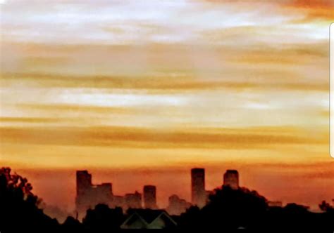 Sunrise over Denver skyline on a foggy morning : r/Denver