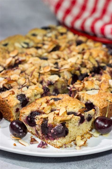 Cherry Almond Cake | Cake filled with cherries + topped with almonds!