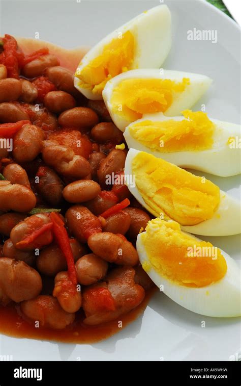 Beans with hard boiled eggs - Fagioli all uccelletto - Lombardia - Italian kitchen Stock Photo ...