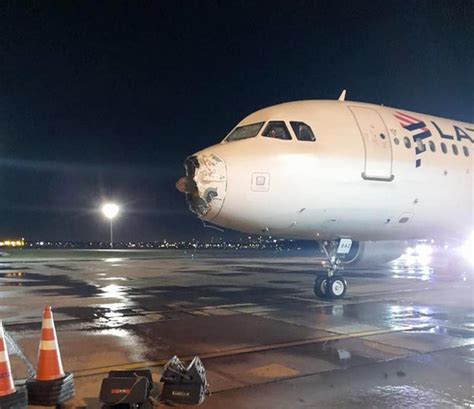 INCIDENT The nose cone of an Airbus A320 has been badly damaged in ...