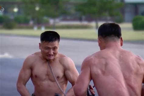 Kim Jong Un enjoys display of force by shirtless soldiers