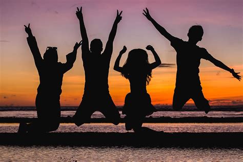 HD wallpaper: Silhouette of People Jumping, backlit, beach, dawn ...