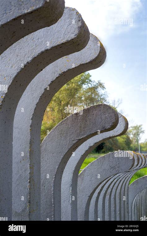 Concrete fence posts Stock Photo - Alamy