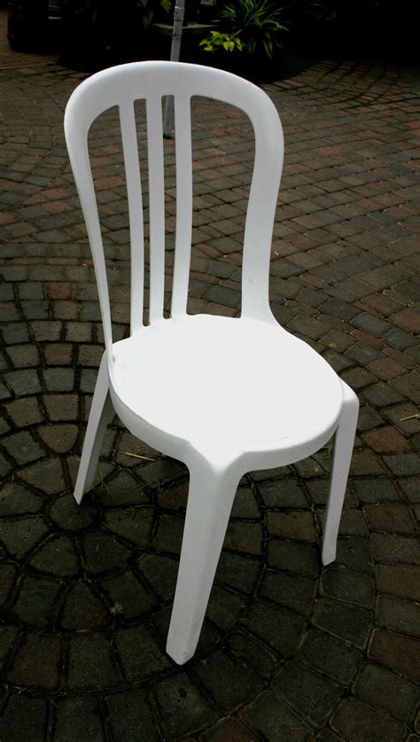 White Plastic Bistro chair. This is a plastic chair that is attractive, stackable and ...