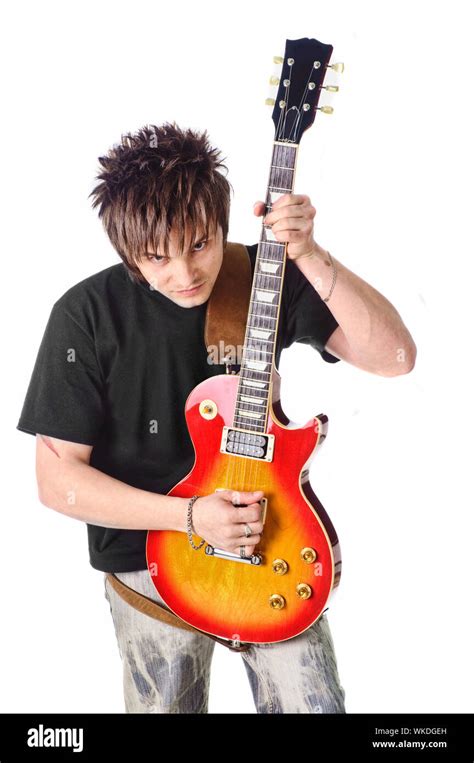 Rocker with his classic electric guitar Stock Photo - Alamy