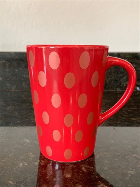 2005 Starbucks Holiday mug. Red with red metallic polka dots. Excellent used condition. No chips ...