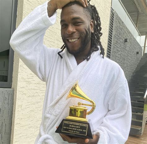 Burna Boy receives his Grammy Award trophy - P.M. News