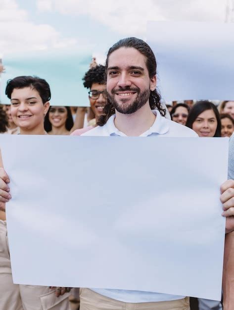 Premium Photo | Man holding a sign during a protest march vertical photo