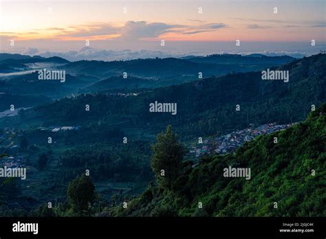 Morning sunrise view of the hills in Ooty with blue tinted landscape ...