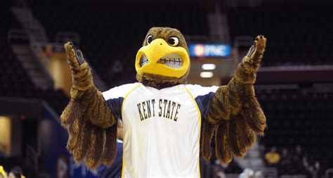 Flash, Kent State’s mascot, reacts to a call from an official during ...