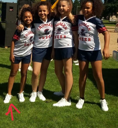 This is the 6th grade cheerleader's and I'm the one with the arrow I had a performance and our ...