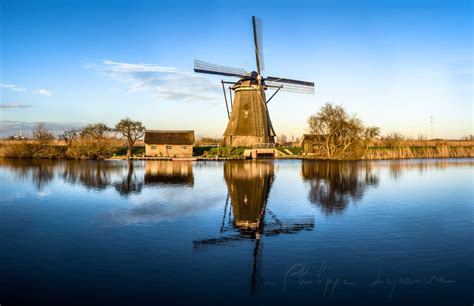 Windmills in Kinderdijk, Rotterdam, Netherlands - Philippe Lejeanvre ...