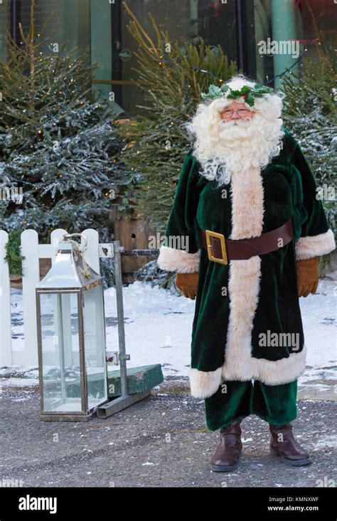 Santa Claus dressed in green Victorian Father Christmas costume at ...