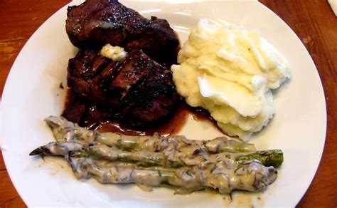 Filet Mignon in Red Wine Reduction Sauce with Tarragon-Garlic Butter – Welcome to Rosemarie's ...