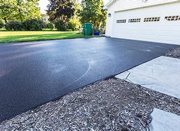 How To Repair Asphalt Cracks In Your Driveway | B&E Coating Services