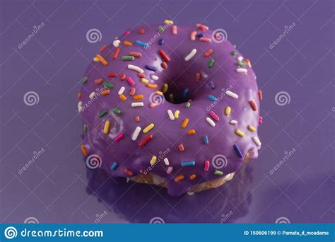 Purple Glazed Donut with Rainbow Sprinkles on Top Stock Image - Image of frosting, stereotype ...