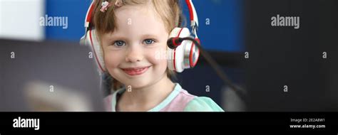 Child using headset and microphone Stock Photo - Alamy