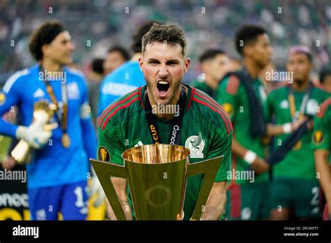 Mexico's Santiago Gimenez lift the winner's trophy after beating Panama ...