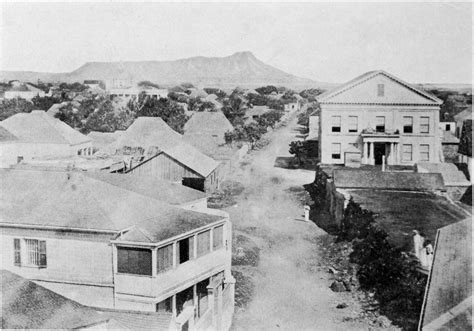 View of Queen Street, Honolulu in 1857, showing at left, Hudson's Bay store, and at right work ...