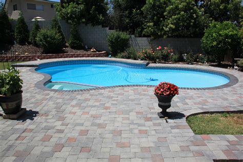 Pavers for pool decks is an excellent choice. Never slippery, and always looks good, from ...