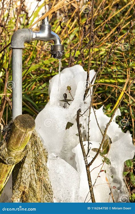 Faucet with frozen water stock photo. Image of freezing - 116264750