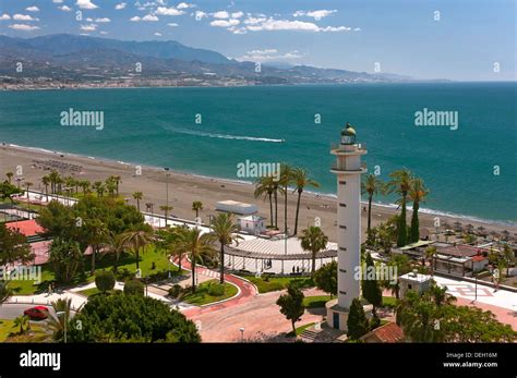 Beach and the lighthouse, Torre del Mar, Malaga-province, Andalusia ...