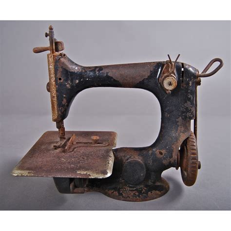 Antique Sewing Machine (Parts still move. Very old item.) Seria…