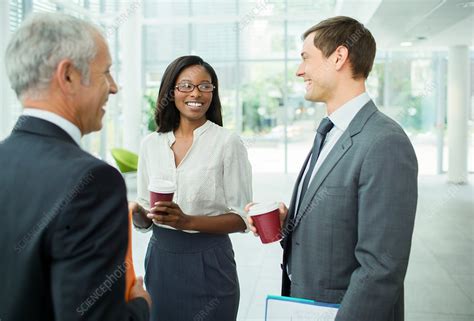 Business people talking - Stock Image - F014/9211 - Science Photo Library